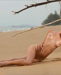 undressed small-tittied fem youth sunbathes without bikini at European beach - Little tits