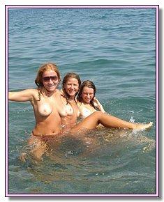 stripped fem youth dropping swimwear on the beaches of Crimea