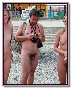 sultry bitches shows  pussy at the nudistic beach
