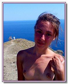 naked amatuer nudes lie in the sun on a hot sand