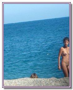 naked ladies sunbathes without bikini on ukraine nude beach