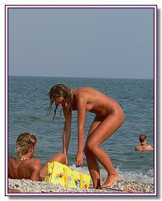 bashful beautifull naked babes shows  pussy at nude beach