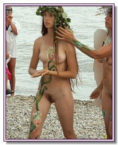 sunburned pretty fem nude remains bare on a hot sand