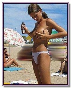obscene teenage nudist girls enjoys nudist life on a sandy beach