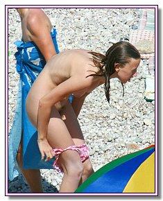 horny exhibitionist teens lie sunbathing naked at nude beaches in Cuba