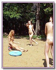 lewd nudist girlfriend fully exposed on a wild beach