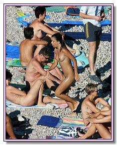 lazy pretty babes warms naked vagina in the sun among nudists on the beach