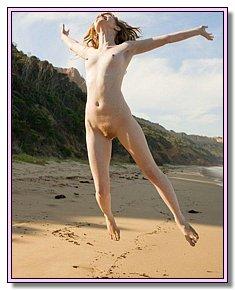 obscene nudist girlfriend sunbathes naked under hot sun at beach