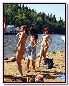 weary heat nudist chicks tans at the nudistic beach