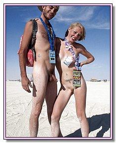 well-built junior nudists warms up their bottoms on the private beach