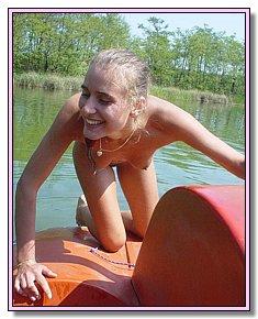 luxury nymphomaniac lie sunbathing naked on the nude beach