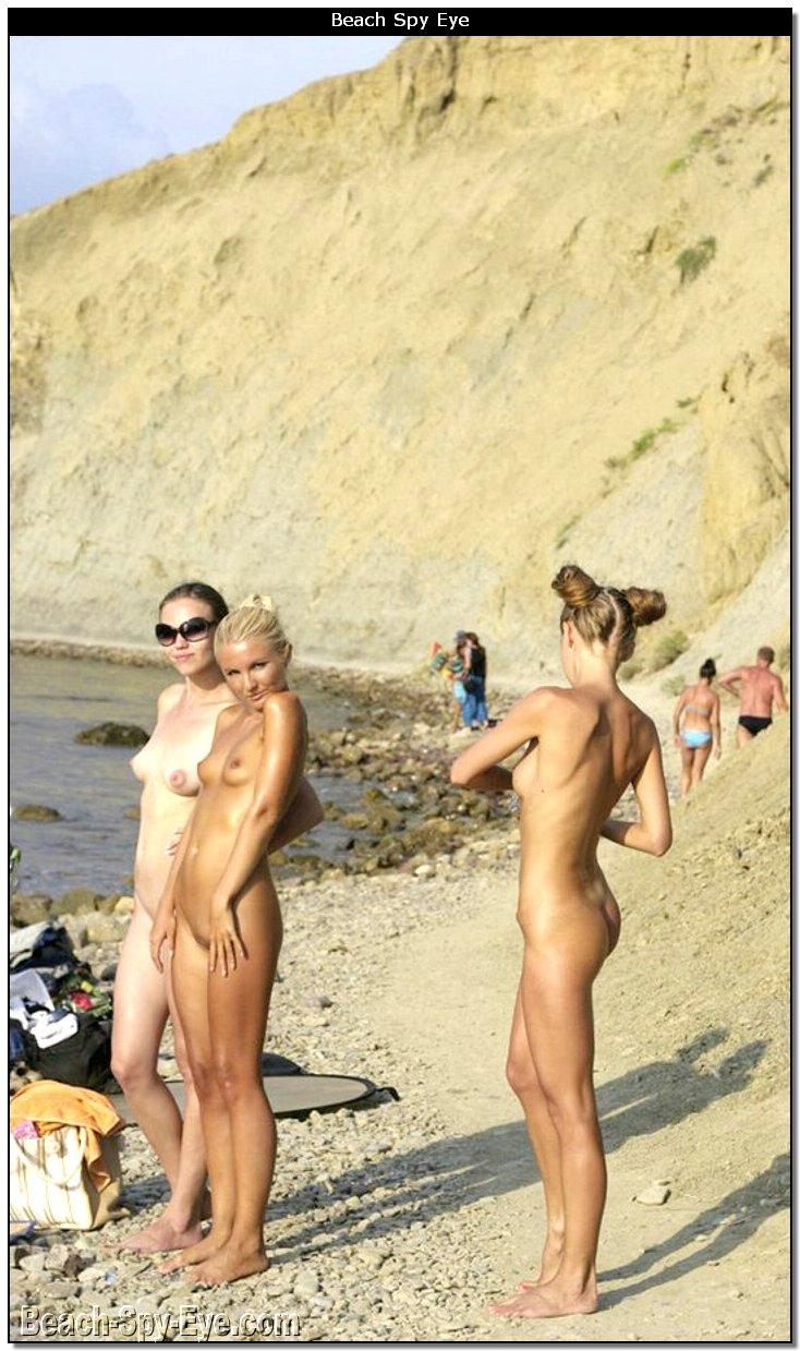 Lewd Female Nude Chicks Has Naked Fun On A Bare Beach