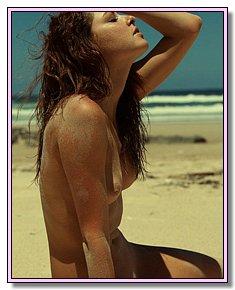 pleasing cute nudists enjoys being naked on the beach