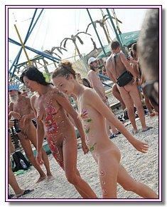 With bald pussy bitches lie sunbathing naked FKK beach