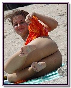 diffident beautifull naked babes flirts with nudist men on a bare beach
