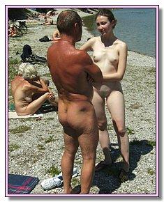 lovely teeny girls trys to be modest in the beach of nudists