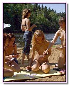 lazy real nudist teenegers shows  pussy under hot sun at beach