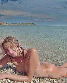 tanned naturist chicks trys to be modest at nude beaches in Cuba