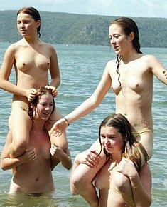 beautiful nudist chicks lie sunbathing naked at nude beaches in spain