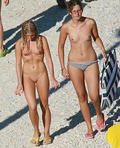 With bald pussy naked teeny girls admires itself on the beaches of Crimea