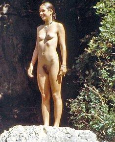 relaxed naturist chicks offers pussy for sun on the beach near the sea