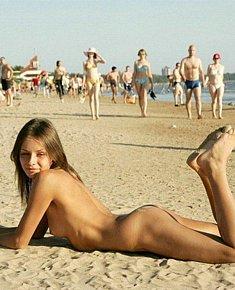 obscene blonds and brunet girls takes sun-bath on a nudist beach