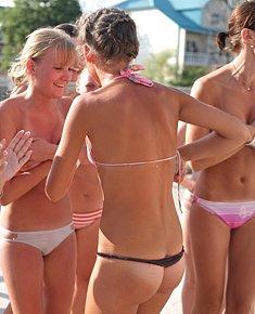 delicious nudist babes takes sun-bath among nudists