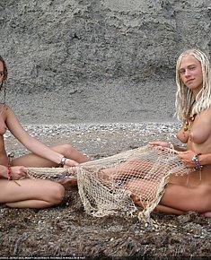 lazy naked girls gets warm for her ass at legal nude  beach