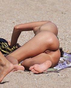 charming amatuer nudes relaxes without clothes FKK beach