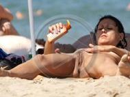 Sprread legs on nude beach