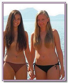 good looking nudist babes trys to be modest on ukraine nude beach