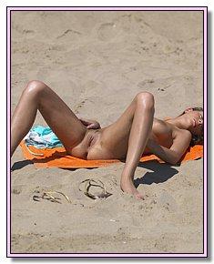 comely beach teens sunbathes at beach among men