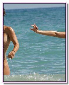 sultry teens remains naked on the beach in Kazantip