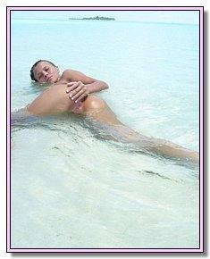 sultry damsels catch admiring glances on nude beach in usa