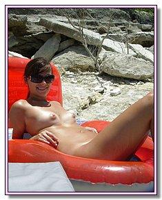 unassuming damsels exposes their pussy on the beach
