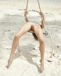Sexy nudist girls are posing nude at beaches and..