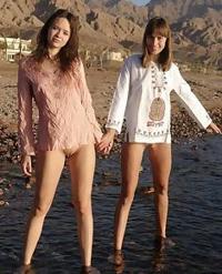 Sexy babes are posing naked at beach and shows off..