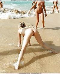Those chicks are uncovering nude on beach and showing..