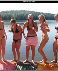 nice-looking beach teens stares nudists on the..
