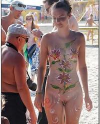 charming teeny girls warms naked vagina in the sun at..