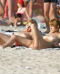 Weak on the front end teeny nudists trys to be modest..
